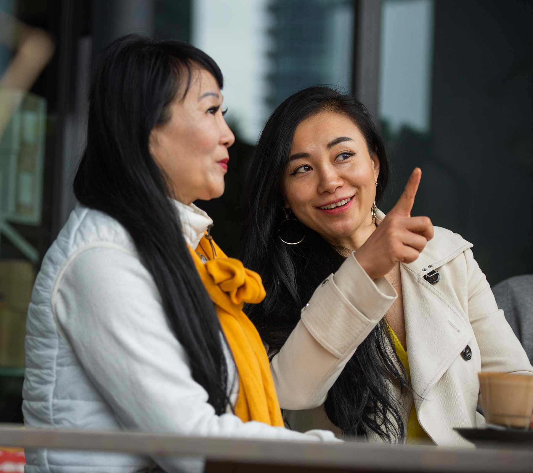 A mother and daughter in conversation.
