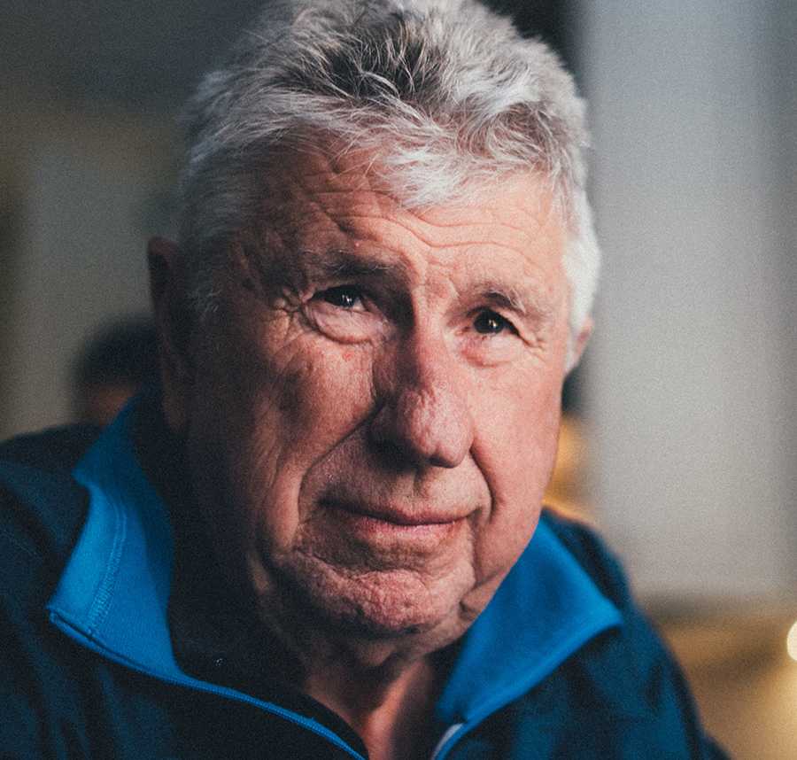 A close up of an older man staring at the camera.