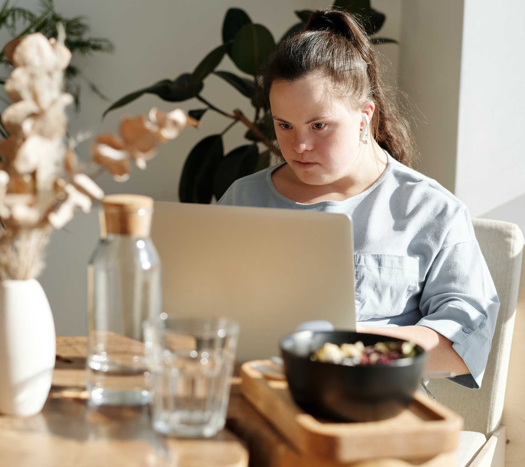 Woman with disability working at home